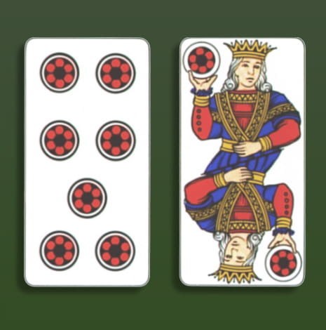Le due carte rappresentative del gioco italiano Sette e Mezzo. Il sette ed il re di denari.